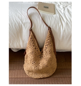 Detail of sunflower cotton rope woven shoulder bag with adjustable leather strap