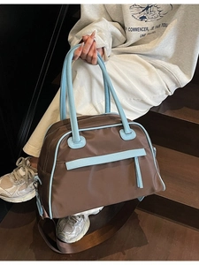 Borsa da viaggio in nylon marrone e azzurro con manici in pelle e tasca con zip frontale