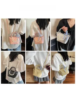 Collage of mini bucket crossbody bags in multiple colors with lace trim and ribbon details