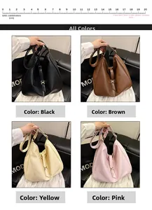 Detail view of large tote bags in black, brown, cream and pink with metal buckle
