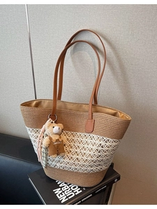 Summer woven tote bag with brown and white mesh design and cute bear pendant