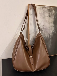 Minimalist large brown hobo tote bag in soft leather finish for modern daily commute