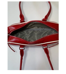 Vertical view of red bag interior with gray herringbone lining and inner zipper pocket