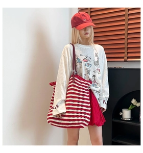 Red and white striped knit tote bag with red leather straps and ALOE letter embroidery
