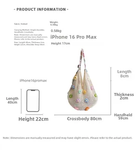 Detail view of cream knit hobo bag with floral patterns and size guide showing dimensions