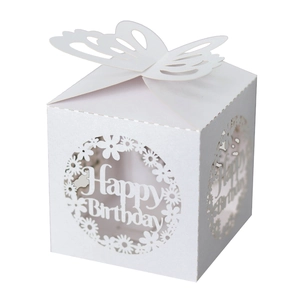 Detail of white hollow laser-cut butterfly gift box with Happy Birthday lettering