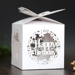 White laser-cut Happy Birthday favor box with 3D butterfly lid and hollow floral wreath
