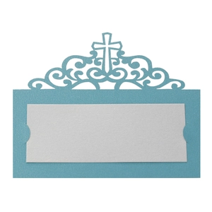 Detail of laser-cut light blue cross place card with intricate vine patterns and white insert