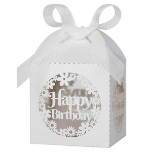 Detailed laser-cut Happy Birthday favor box in pearl white with silk ribbon bow