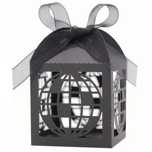 Elegant black laser-cut globe gift box with a sheer organza ribbon bow for celebrations
