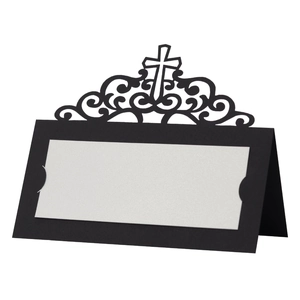 Elegant laser-cut hollow cross place card in black and white for wedding table decor