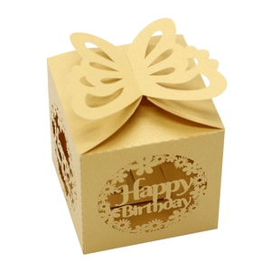 Detail of golden laser-cut Happy Birthday candy box featuring 3D butterfly and flowers
