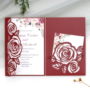 Laser cut dark red rose wedding invitation set with floral card on elegant background
