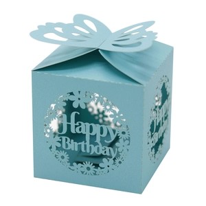 Detail of light blue gift box with laser-cut flowers and 3D butterfly closure