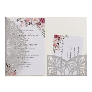 Elegant laser cut silver glitter wedding invitation set with floral watercolor cards