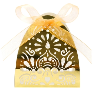 Detailed laser-cut gold wedding favor box with floral patterns and a matching organza ribbon