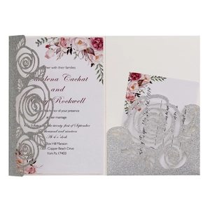 Elegant laser cut silver glitter wedding invitation with watercolor pink floral inner card
