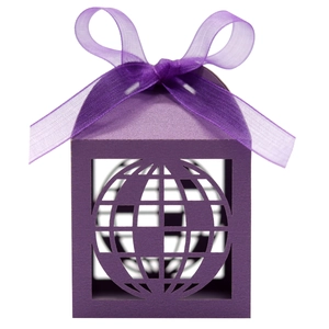Macro view of purple globe-pattern hollow candy box with matching sheer ribbon bow
