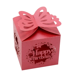 Detail of red laser-cut candy box with 3D butterfly closure and Happy Birthday design