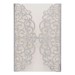 Elegant laser-cut silver glitter invitation featuring intricate scrolls for weddings