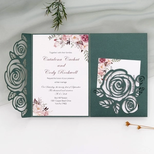 Laser-cut dark green wedding invitation set with rose pattern and white floral cards