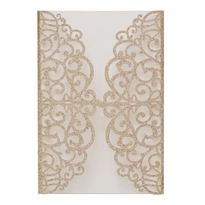 Close-up of champagne gold laser-cut hollow pattern on glitter wedding invitation card