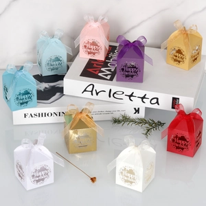 Detailed laser-cut candy boxes in assorted colors with Happy Birthday ribbons