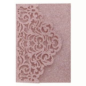 Edle lasergeschnittene Hochzeitseinladung in Roségold mit Glitzer und filigranem Muster