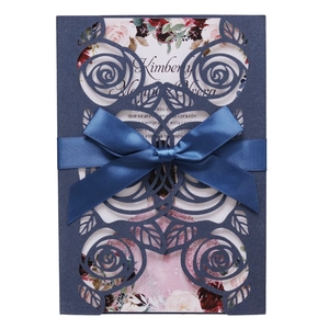 Laser cut navy rose wedding invitation with silk ribbon bow and floral insert card