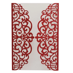 Elegant red laser-cut invitation cover with glitter finish and vine patterns