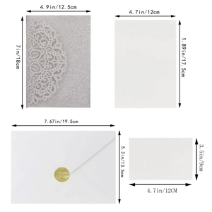 Detailed view of silver glitter laser-cut wedding invitation set with dimensions