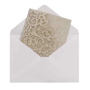 Close-up of champagne gold glitter wedding invitation with elegant floral relief patterns
