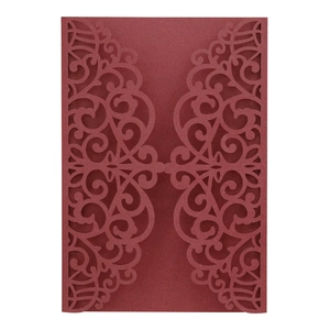 Elegant burgundy laser cut wedding invitation covers with intricate floral pattern