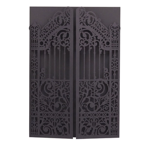 Laser cut black wedding invitation card featuring intricate vintage gate design and patterns
