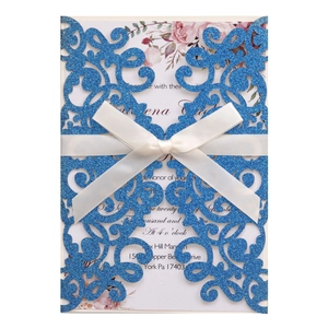 Laser cut blue glitter wedding invitation with white satin ribbon and floral card insert