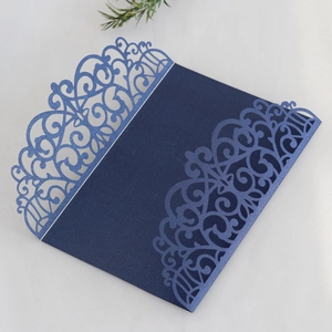 Detailed laser cut vintage floral pattern on navy blue pearlescent invitation cover