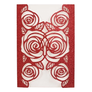 Close-up of red glitter laser-cut rose floral wedding invitation card detail