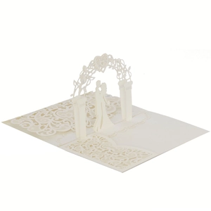 Detail of 3D laser cut wedding card showing bride and groom under floral archway
