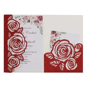 Pink laser-cut rose wedding invitation with glitter finish and floral watercolor insert