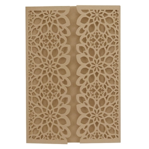 Close-up of laser-cut mandala pattern on kraft paper wedding invitation cover sleeve
