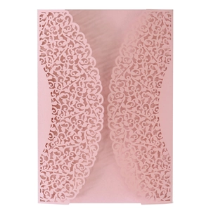 Pink laser-cut pearl paper wedding invitation with intricate floral lace pattern