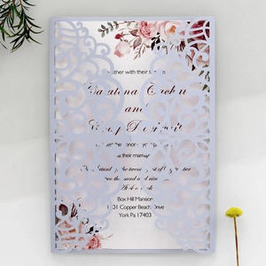 Detailed laser-cut lavender wedding invitation with elegant floral inner card design