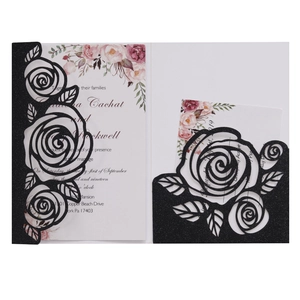 Elegant laser cut wedding invitation with black glitter rose design and floral inner card