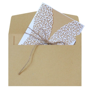 Laser cut lace wedding invitation set with kraft paper card and vintage twine detail