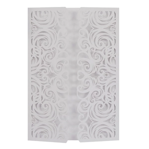 Detail of laser-cut white butterfly wedding invitation with elegant hollow vine patterns