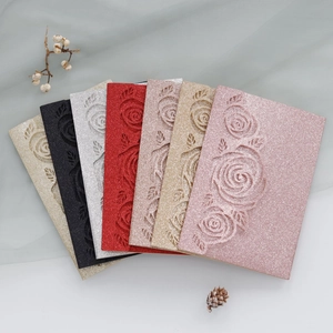 Detail of glitter laser-cut rose invitations in six colors for weddings and events