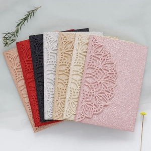 Detailed laser-cut hollow invitations with glitter finish in multiple elegant colors