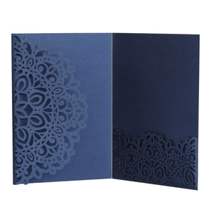 Detail of dark blue laser-cut invitation holder with intricate mandala patterns