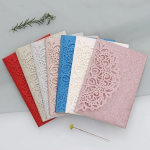 Detailed fan-shaped layout of glitter laser-cut wedding invitation cards in seven colors