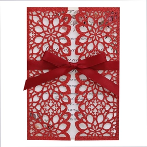 Elegant red glitter laser-cut wedding invitation with satin ribbon and floral inner card